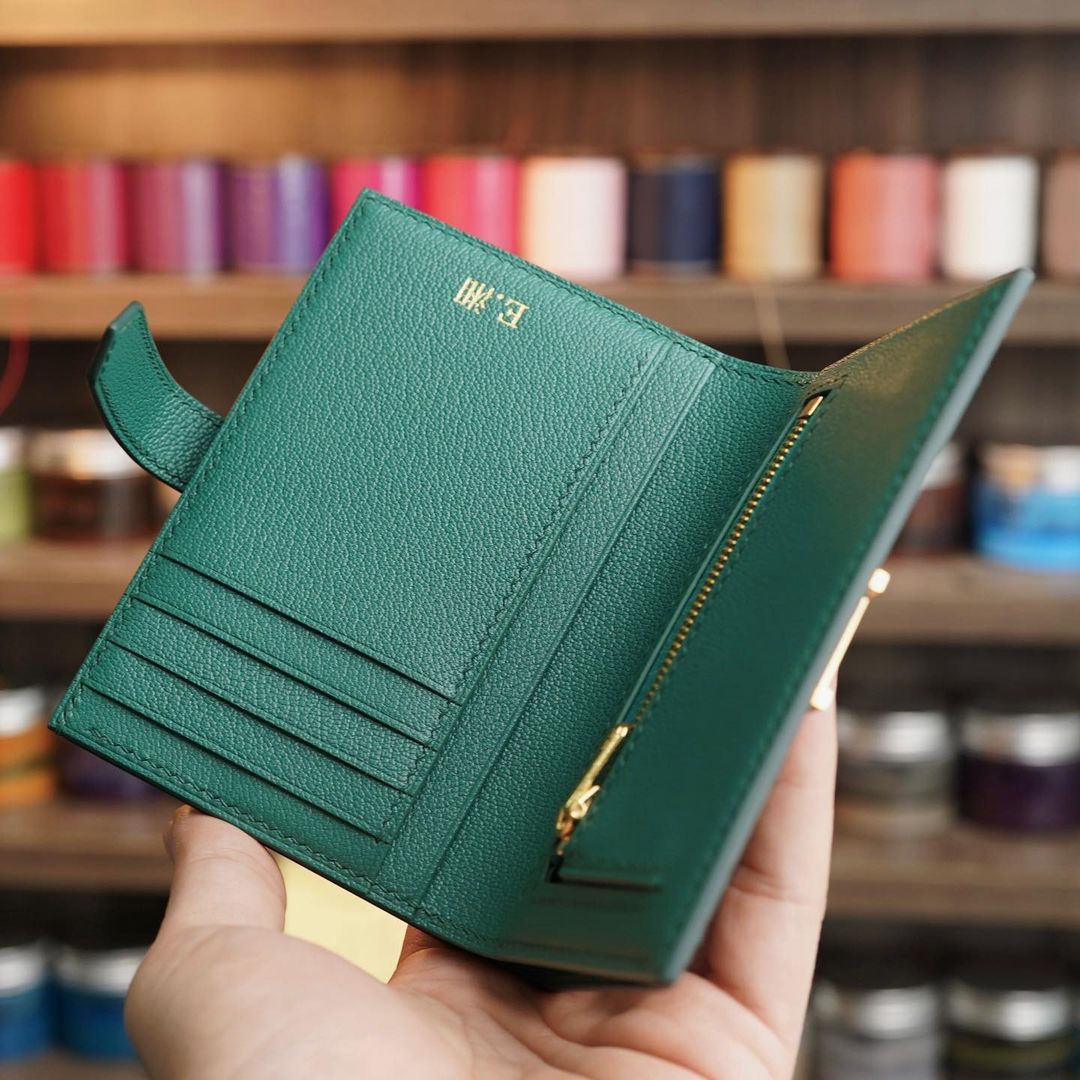Green wallet with zip coin compartment
