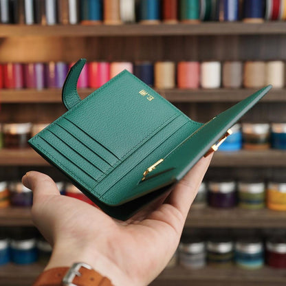 Green wallet with zip coin compartment